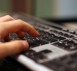 1260787_20061053 Hand-Laptop-Keyboard-Online
